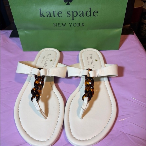 kate spade Shoes - kate spade White Sandal with Tortoiseshell Chain Accent